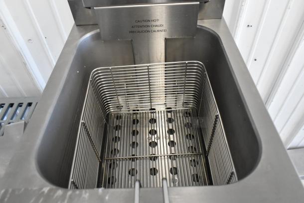 2024 Vollrath FFA8115 Stainless Steel Electric Fryer with metal fry basket and lid, caution label visible, 208-240V, 1 Phase.