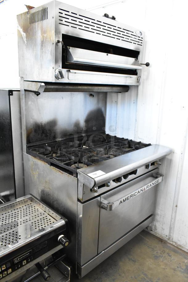 American Range stainless steel commercial gas 6-burner range with oven, salamander cheese melter, backsplash. Visible wear.
