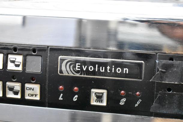 Dalla Corte Evolution 20.03 stainless steel 3-group espresso machine, features control panel with buttons and display. Model "Evolution".