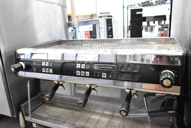 Dalla Corte Evolution 20.03 stainless steel commercial espresso machine, 3 groups, 3 portafilters, 2 steam wands, 220V.