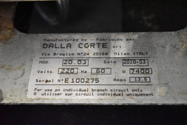 Dalla Corte Evolution 20.03 espresso machine label, detailing model, volts, watts, and serial number for potential buyers.