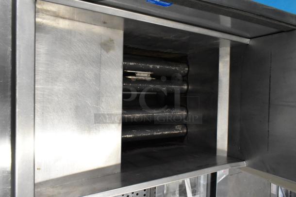 2021 Cecilware FMS504NAT stainless steel commercial floor-style natural gas fryer interior, showing heating tubes.