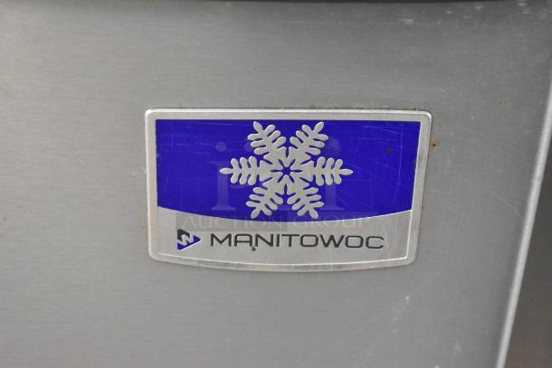 Manitowoc D320 stainless steel ice bin with logo. Model: D320, in good condition. Ideal for commercial use.