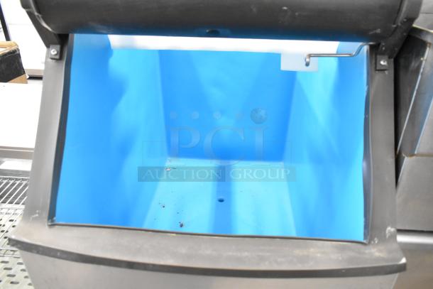 Manitowoc D320 Stainless Steel Commercial Ice Bin, blue interior, good condition, suitable for commercial use.