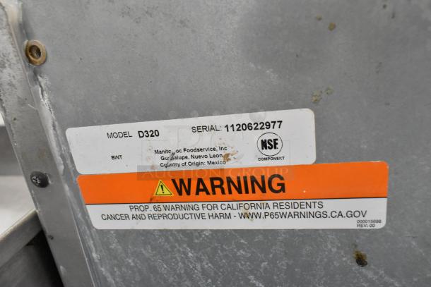Manitowoc D320 stainless steel commercial ice bin label, showing model, serial number, NSF certification, and Prop 65 warning.