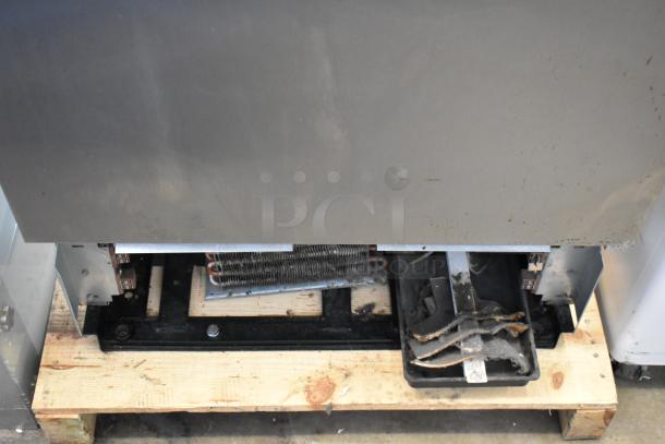 True T-19F Stainless Steel Freezer, showing bottom component area, 115V, 1 Phase, commercial condition evident.