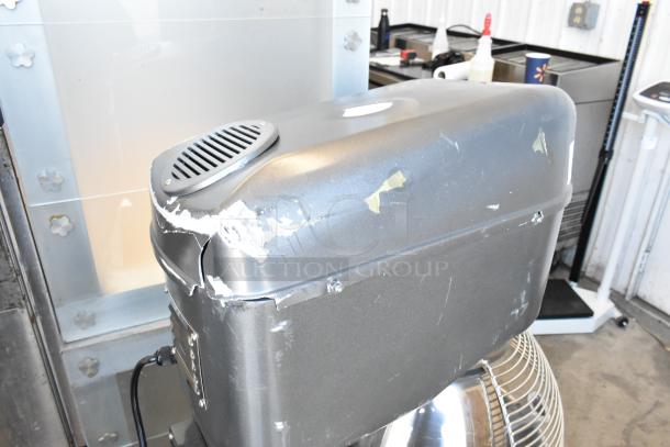 Avantco MX40H commercial dough mixer, 40 qt, metal, bowl guard, visible wear, includes attachments, 240V, 1 phase.