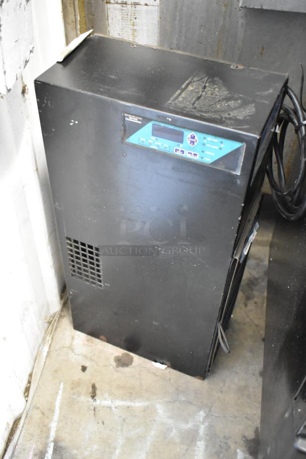 2 Ice Qube IQ1800VS Vertical Slimline Air Conditioners, 120 Volts, 1 Phase, black, visible wear.