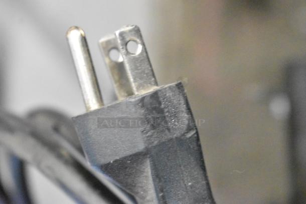 Close-up of a power plug for a 2 Ice Qube IQ1800VS Vertical Slimline Air Conditioner, 120 Volts, 1 Phase.