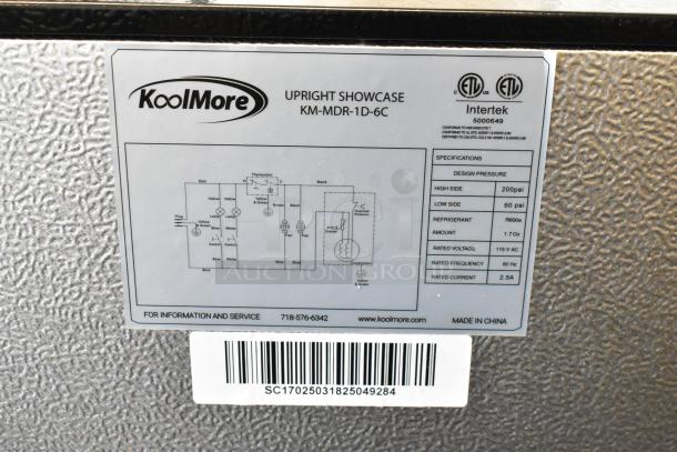 Label on KoolMore KM-MDR-1D-6C cooler shows model details, electrical specs, and refrigerant type. Made in China.