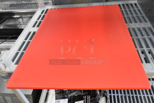 Red polyethylene cutting board, brand new, 24" x 18" x 1/2" size, slight scratch and dent, smooth finish, durable and versatile.