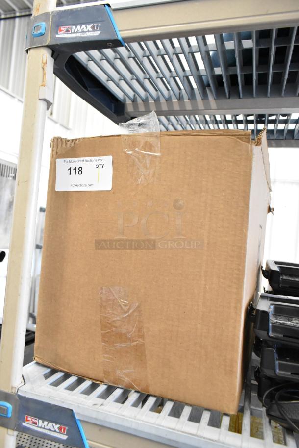 Cardboard box labeled "118 QTY" containing glasses, placed on a shelf. Box shows light wear.