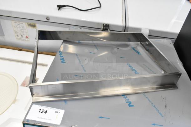 Stainless steel drop-in bin, labeled "Nitto," with protective film. Auction tag "124 QTY." New condition.