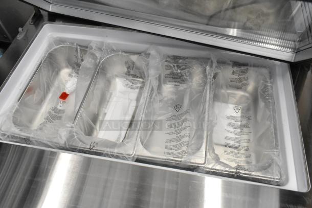 KoolMore KM-CGD-8HP ice cream display case with 4 pans, stainless steel, 110-120V, glass sneeze guard broken.