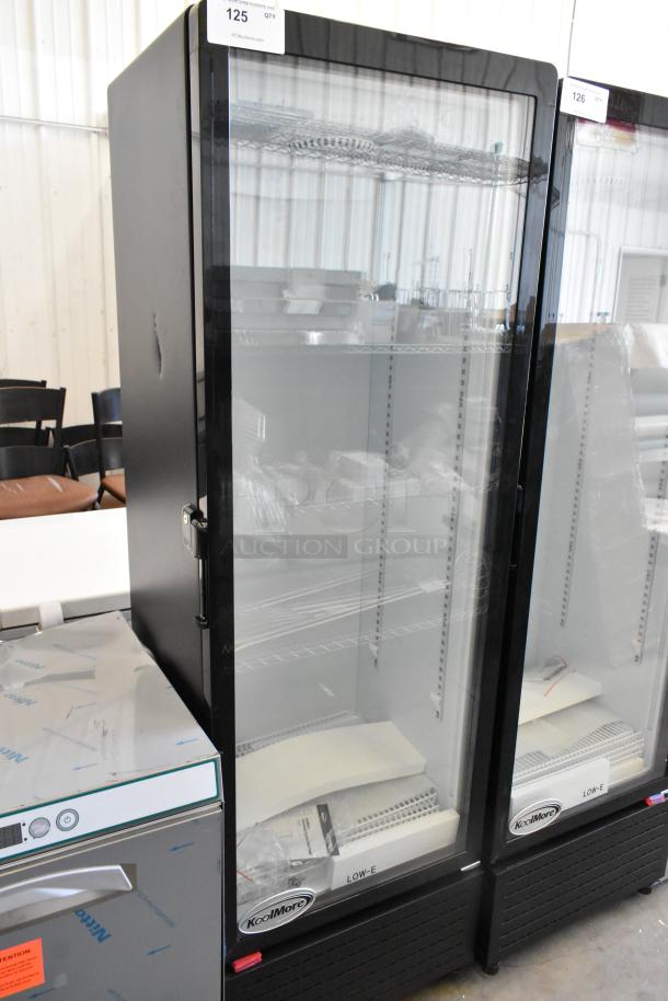 Brand new KoolMore KM-MDR-1GD-10C metal commercial single door reach-in cooler merchandiser with poly-coated racks and commercial casters.