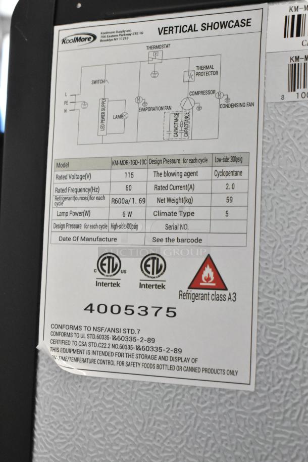 KoolMore KM-MDR-1GD-10C label showing specs: 115V, 60Hz, 6W lamp, ETL certified. Made for merchandise refrigeration.