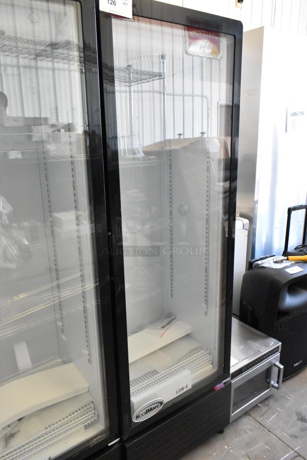 Brand new KoolMore KM-MDR-1GD-10C single door reach-in cooler on casters, with poly-coated racks. Scratch and dent condition.