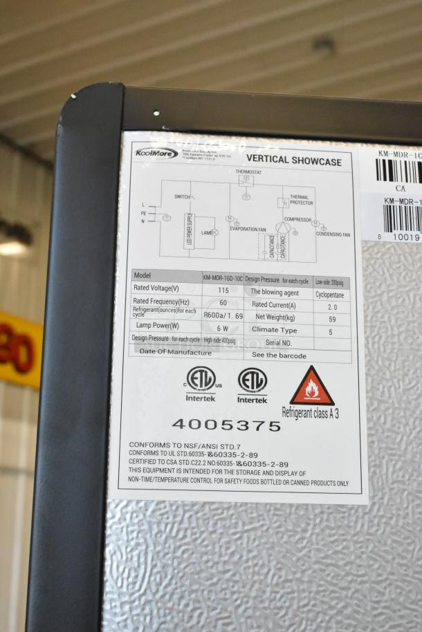 KoolMore KM-MDR-1GD-10C cooler label showing specs like 115V, R600a refrigerant, ETL certification, and safety standards.