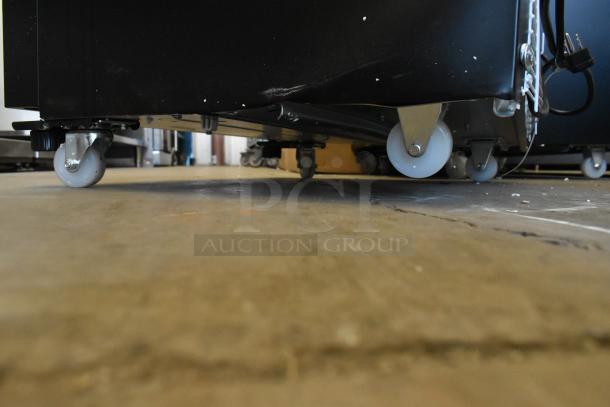 Brand new KoolMore KM-MDR-1GD-10C cooler base with commercial casters. Scratch and dent condition. 115V, 1 phase.