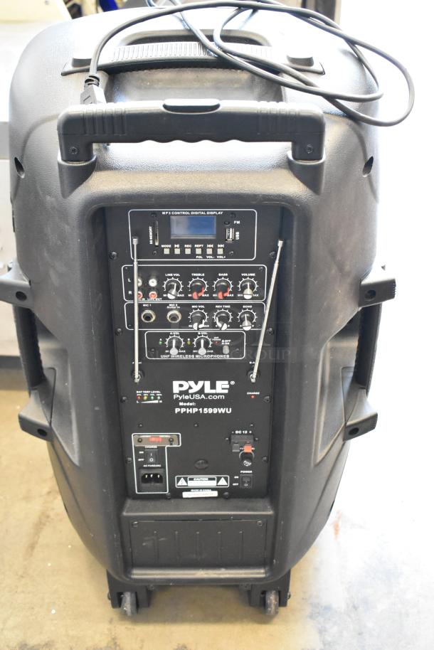 Pyle PPHP1599WU speaker, black, with control panel and handles. Features include volume knobs, input ports, and MP3 control.