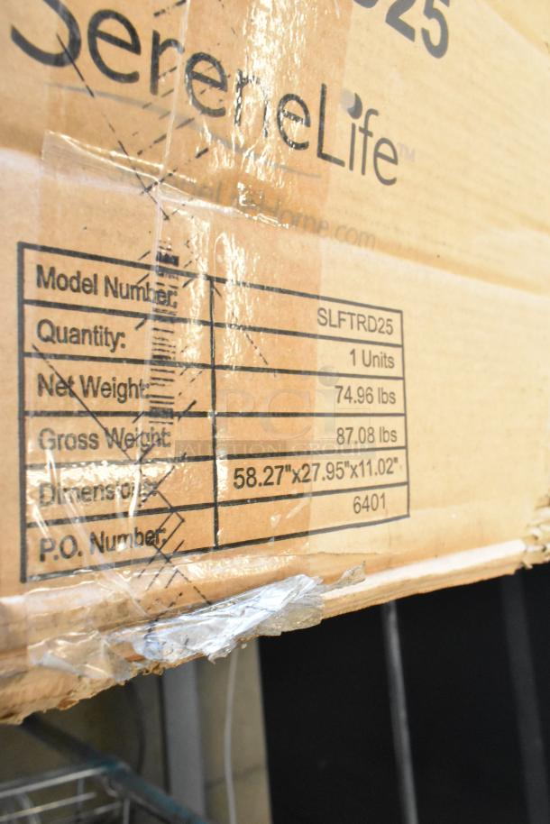 Cardboard box labeled "SereneLife SLFTRD25," indicating a new treadmill with manual incline, weight details, and dimensions.