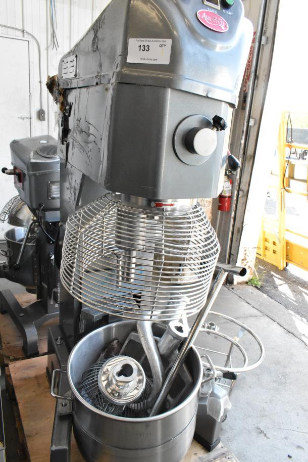 Brand new Avantco 177MX60H 60-quart metal dough mixer with stainless steel bowl, bowl guard, dolly, hook, paddle, and whisk. 