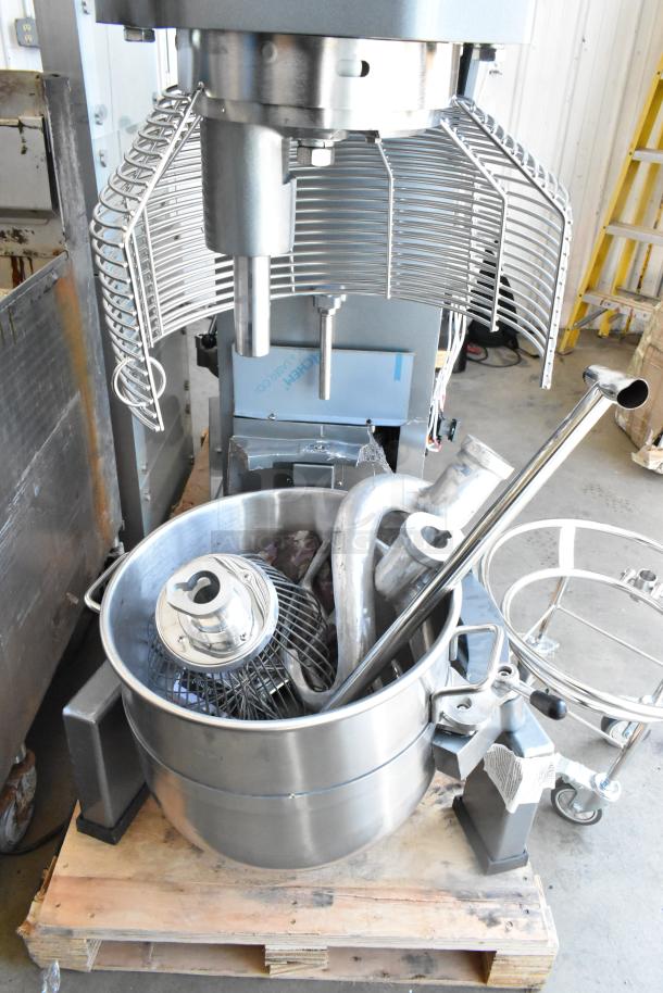 Brand new Avantco 177MX60H 60-quart dough mixer with stainless steel bowl, guard, dolly, hook, paddle, and whisk. 240V, 3-phase.