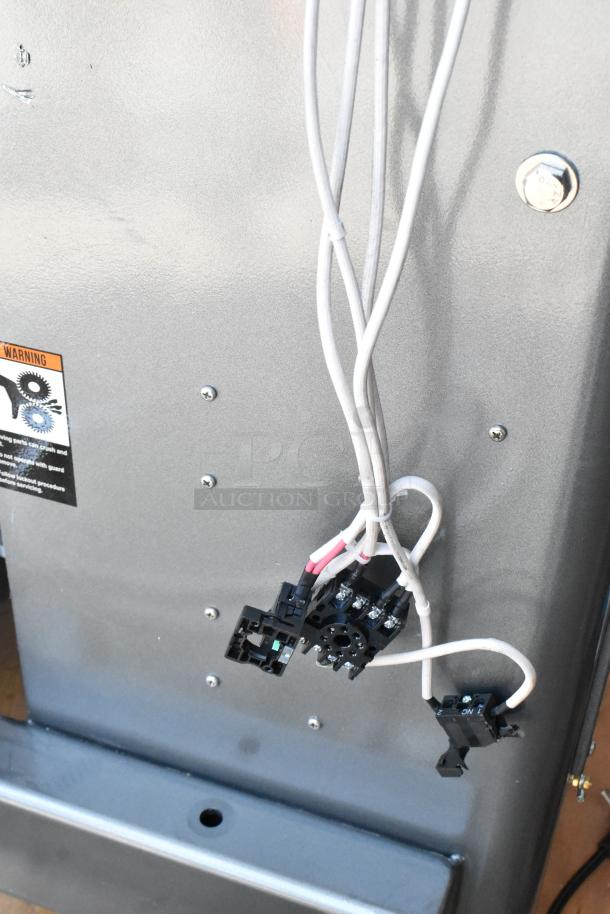 Avantco 177MX60H commercial dough mixer control panel close-up, showing wiring and a warning label.