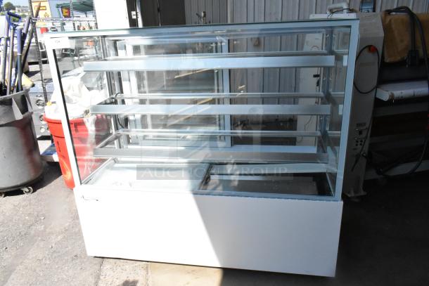 Brand new Avantco 193BCF60W refrigerated bakery display case, 35 3/8", glass, white, on casters, 115V, 1 phase, minor scratches.