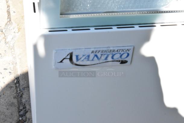 Brand new Avantco 193BCF60W refrigerated bakery display case with square glass, on commercial casters, visible logo.
