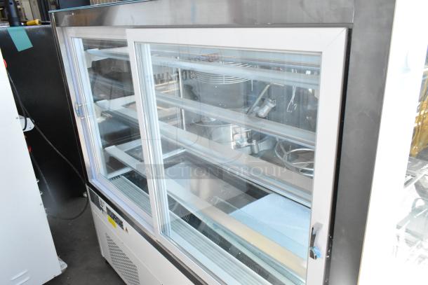 Brand new Avantco 193BCF60W refrigerated bakery display case, 35 3/8" square glass, white, on commercial casters, 115V.
