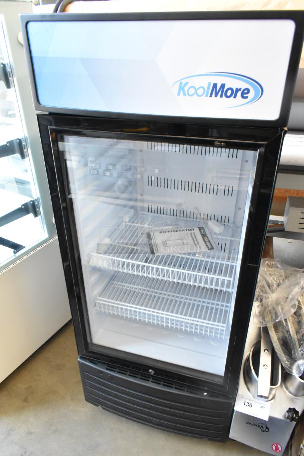 Brand new KoolMore KM-MDR-1D-6C commercial single door cooler, metal frame, poly-coated racks, 115V, on casters.