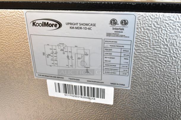 KoolMore KM-MDR-1D-6C metal commercial cooler label showing voltage, refrigerant specs, and contact info.