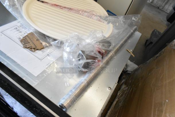 Brand new KoolMore KM-CWO24-AFSS 24" speed oven microwave. Notable: glass damage. Includes accessories. 120V, 1 phase.