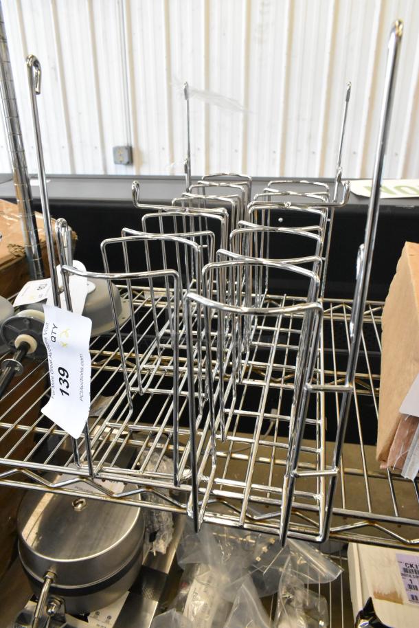 Two brand new metal racks, scratch and dent condition, with metal wireframe and auction tag number 139.