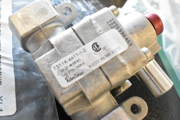 Robertshaw TS11K-4411-1-0 valve, new condition, marked "ASSEMBLED IN MEXICO," includes model and pressure info.