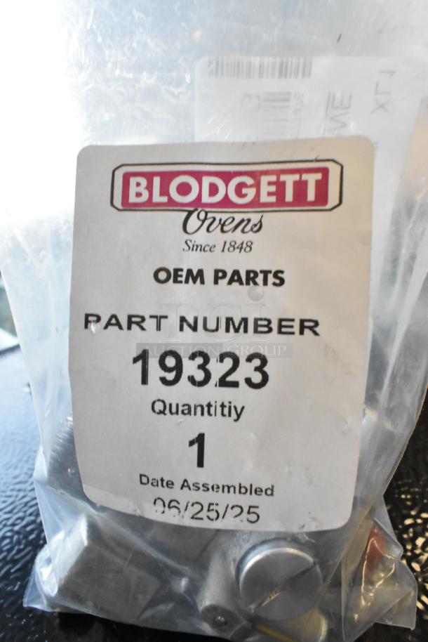 Blodgett OEM 19323 Safety Valve in packaging, labeled with part number, quantity, and assembly date. Brand new condition.