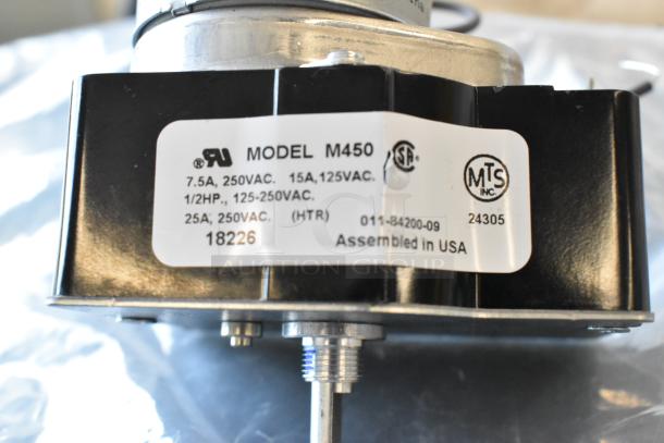 M450 fan label, marked "7.5A, 250VAC," "15A, 125VAC," "Assembled in USA." Part of a scratch and dent auction bundle.