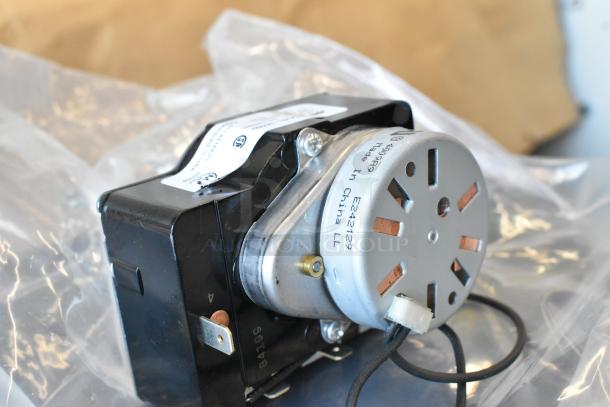 Brand new M450 fan motor with labeling "Made in China" and serial numbers. Part of a scratch and dent auction set.