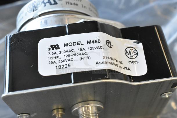 Model M450 fan, new condition, label: 7.5A-25A, 250VAC, assembled in USA. Includes markings from UL, CSA, MTS.