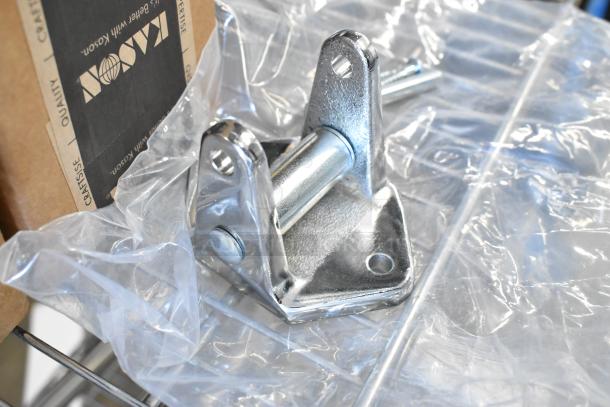 New Kason hinge pieces, polished metal with dual attachment points, in original packaging. Box marked with Kason branding.