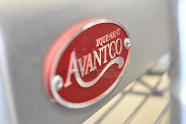 Avantco 177SL310 commercial meat slicer with blade sharpener, metal build, 115V, 1 phase, brand new with minor scratches, logo visible.
