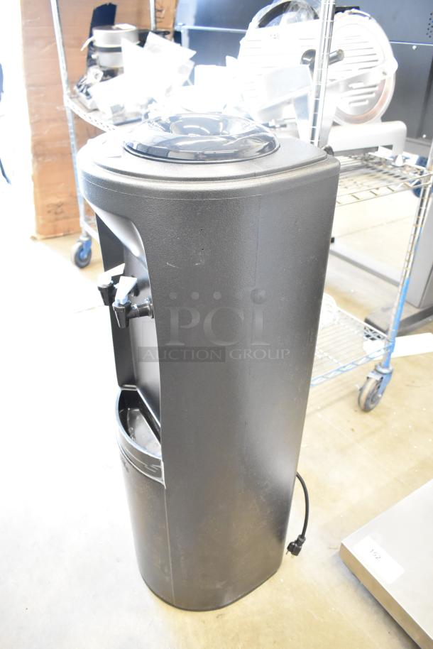 Brand new Oasis QBPD1SK floor-style water cooler base, 115 volts, 1 phase, minor scratches and dents, black exterior.
