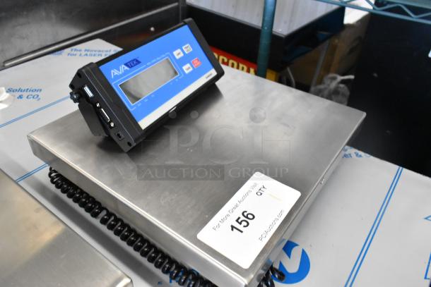 Brand new AvaTek 334RS150 digital receiving scale, 150 lb. capacity, with remote display. Slight cosmetic scratches visible.