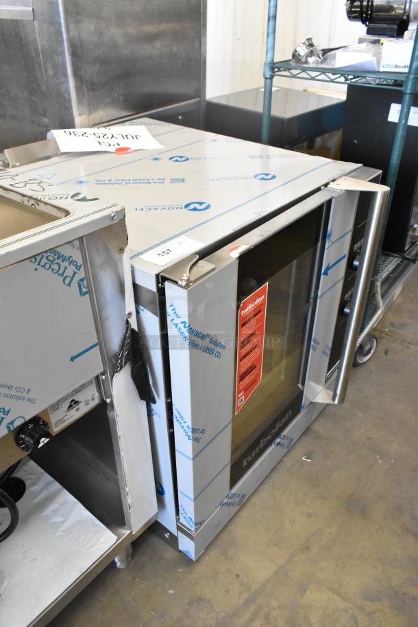 Brand new Moffat Turbofan G32D5-1 convection oven, stainless steel, 34,500 BTU, gas-powered, steam injection, minor damage.