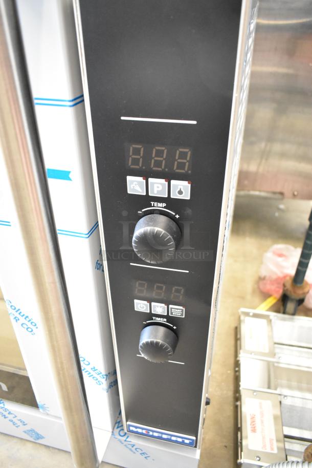 Brand new Moffat Turbofan G32D5-1 digital convection oven with steam, stainless steel, 34,500 BTU, minor scratches.