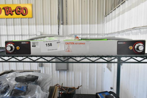 BRAND NEW ServIt 423SW24INHDBLA 24" double strip warmer, dual adjustable controls, 120V, scratch and dent condition.