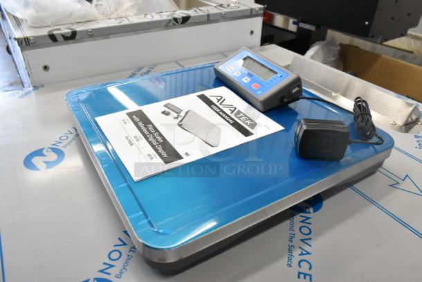 Brand new AvaTek 334PZ60, 60 lb. pizza/portion scale with wireless digital display, user manual, and charger.