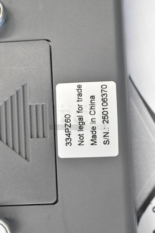 AvaTek 334PZ60 pizza scale detail showing model label with "Not legal for trade" and serial number. New condition.