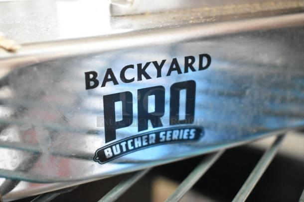 Brand new Backyard Pro Butcher Series #12 electric meat grinder, model 554BSG12, stainless steel, 120 volts, scratched.